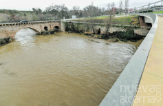 El Henares roza el nivel rojo a su paso por Guadalajara y el Ayuntamiento refuerza la vigilancia